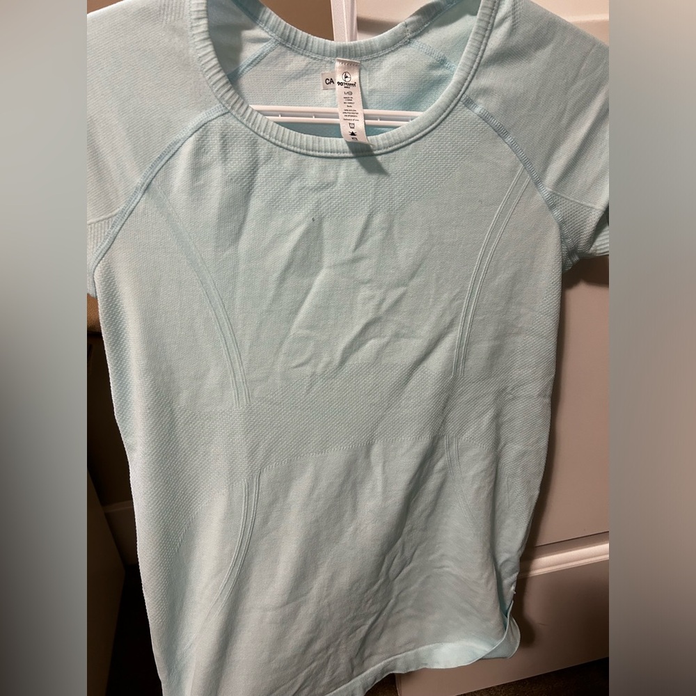 Kyodan Girls workout top pastel green short sleeve